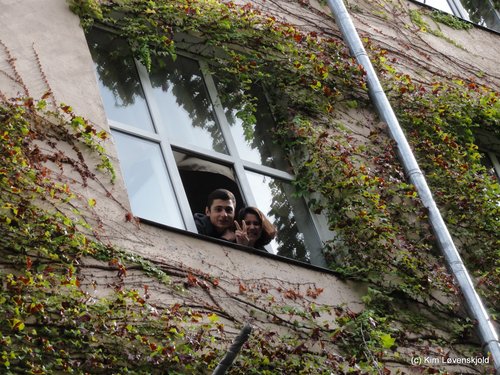 Tbilisi, Georgia. School pupils hanging out the window