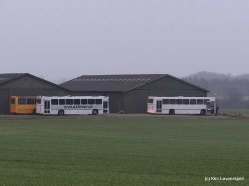 Preserved buses at a farm