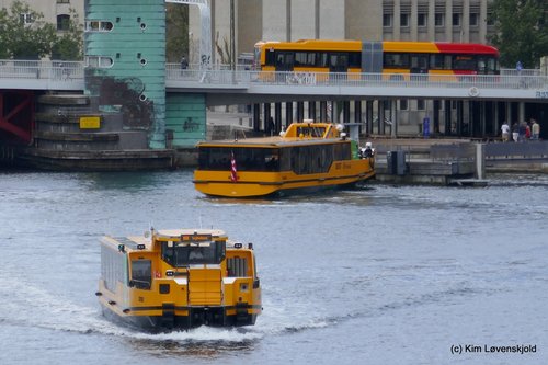 Three electric Movia buses. Two harbour buses and a VDL electric passing on the Knippelsbro bridge