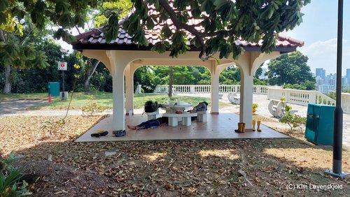 Telok Blangah Hill Park. Migrant workers lunch time break